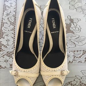 Gently used white patent leather heels